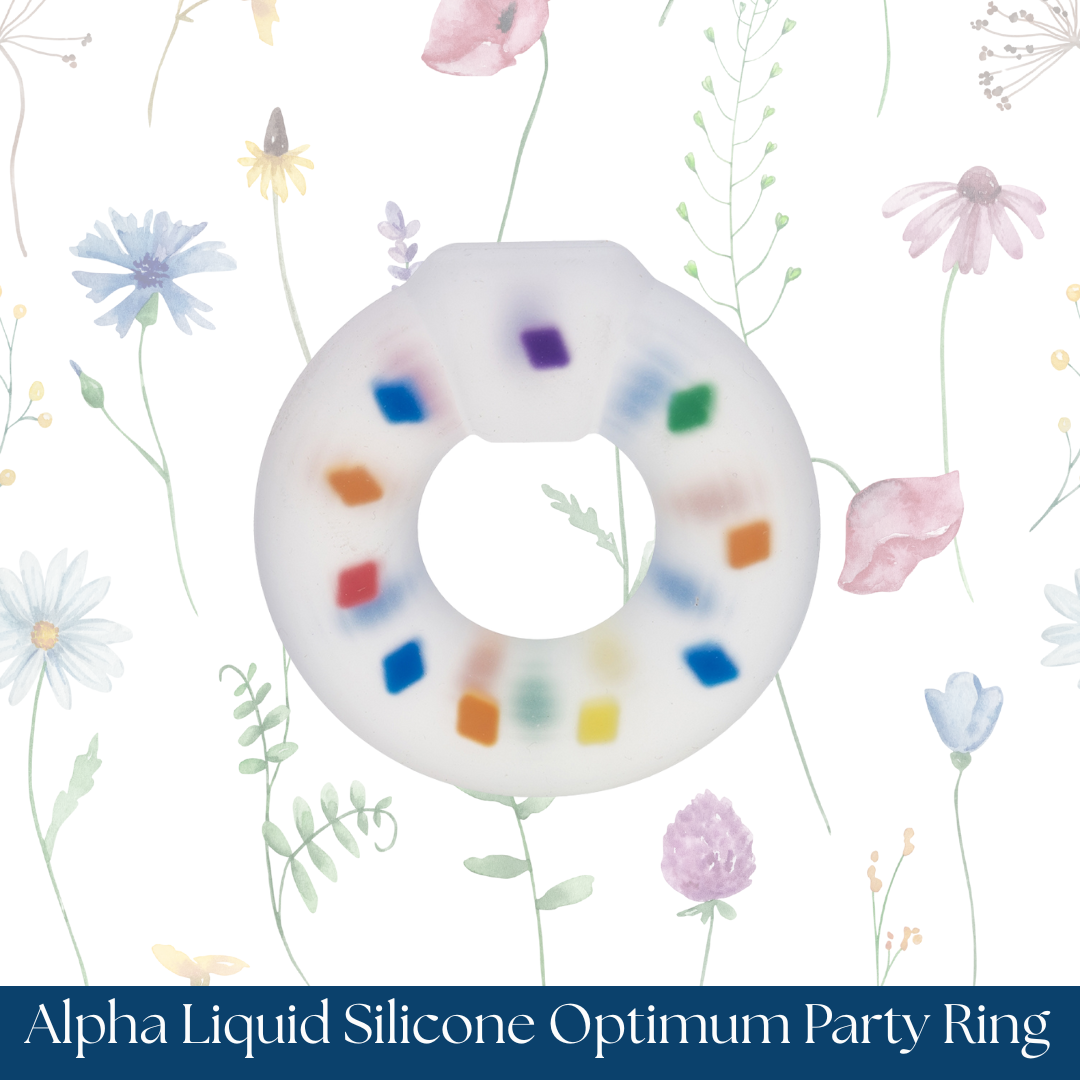 Alpha Liquid Silicone Optimum Party Ring with colorful sprinkles on a floral background